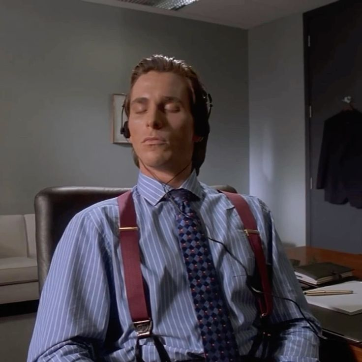 person listening to relaxing music with headphones